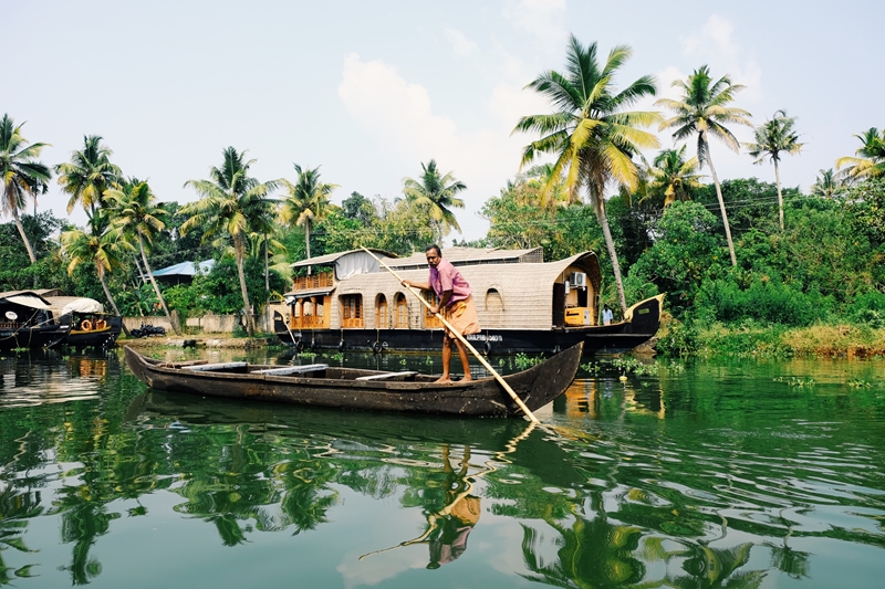Take a trip on a houseboat to explore the Kerala backwaters.